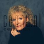 18-12-1987 Petula Clark at studio in Amterdam, The Netherlands. December 18, 1987. 

[keywords]Posed, Headshot, Eye Contact[/keywords]